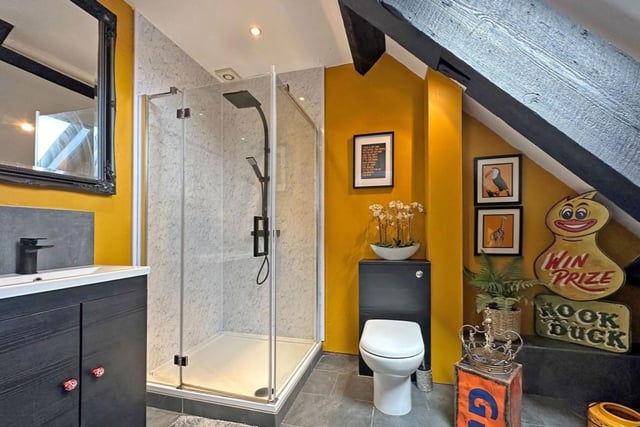 The second bathroom also boasts a contemporary modern suite.