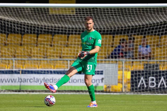 Harrogate Town goalkeeper James Belshaw had to be substituted before half-time on the opening day of the 2024/25 season. Pictures: Matt Kirkham
