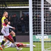 Harrogate Town striker Luke Armstrong celebrates after Jack Diamond's effort is deflected into the Bradford City net during his side's 2-0 win over the Bantams in early February. Pictures: Matt Kirkham