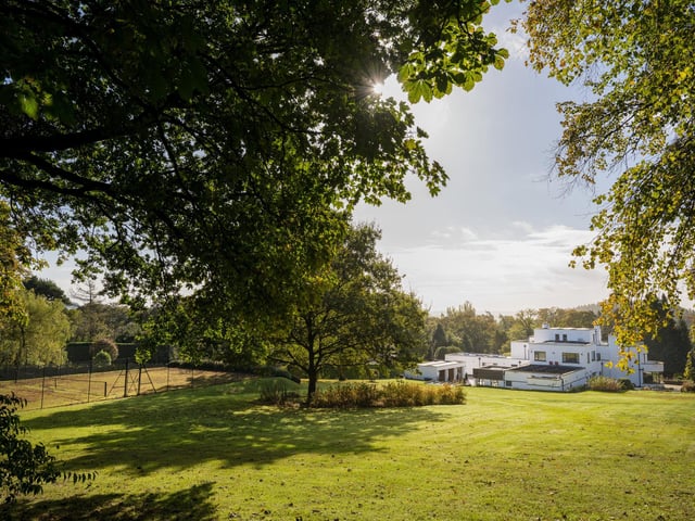 Looking down to the house across its extensive grounds.