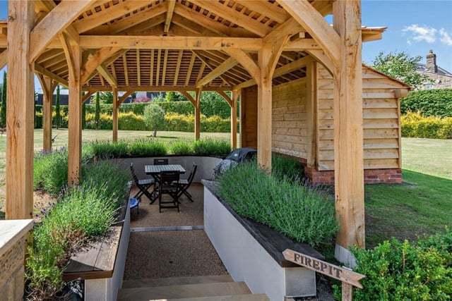 An oak framed gazebo forms part of the outdoor facilities.