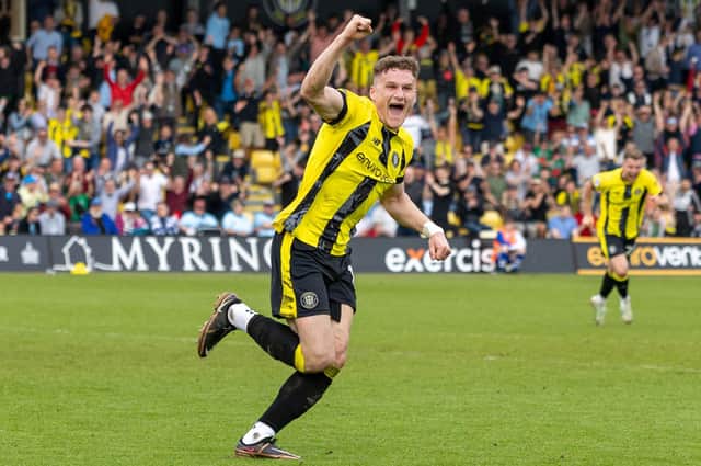 Toby Sims celebrates after seeing his 87th-minute header deflected in off Grimsby's Danny Rose to earn Harrogate Town a 2-2 draw at Wetherby Road. Pictures: Jez Tighe/ProSportsImages