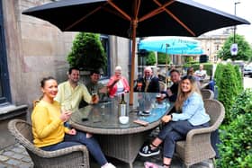 ustomers in the outdoors area of the Fat Badger bar, which is based at the White Hart Hotel on Cold Bath Road in Harrogate.