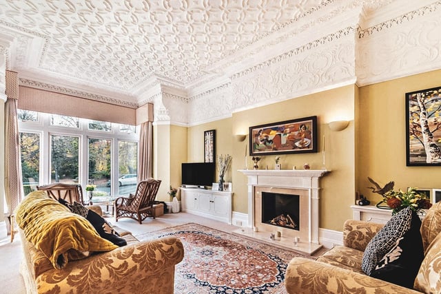 The three bedroom apartment has period features including stunning ornate ceilings in three spacious rooms.