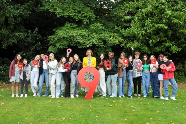 Principle of Harrogate Ladies' College Mrs Sylvia Brett celebrates with students