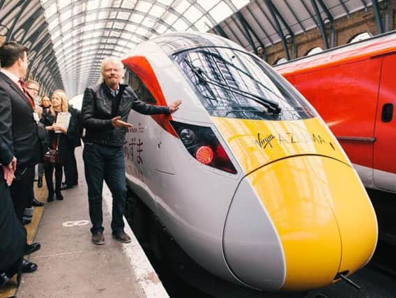 Sir Richard Branson unveils the Virgin Azuma  the first of Virgin Trains new fleet of trains which is set to revolutionise travel on the East Coast from 2018