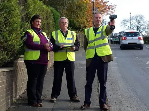 Pannal Community Speed Watch group volunteers - From left,  Cathy Burrell, Howard West and Mark Siddall (Group Lead).