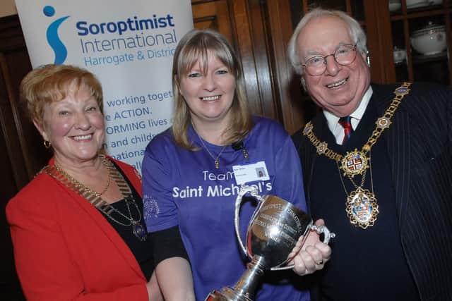.Overall Charity Shop winner Kim Mays of  St. Michael's Hospice Starbeck with The President of Harrogate Soroptimists Pat Shore and The Mayor of Harrogate Coun Nick Brown. (1611295AM2)