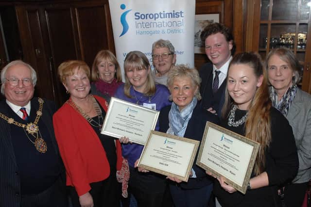 The Mayor of Harrogate Coun.Nick Brown, President of the Harrogate Soroptimists Pat Shore and Sandra Jowett(Soroptimists) with charity shop winners Kim Mays and Lindsey Crawford of St. Michael's Hospice Starbeck, Beverley Cooper and Kieran Young of Shelter (Harrogate) and Polly Harvey and Marjorie Gee of St. Michael's Hospice Ripon. (1611295AM1)