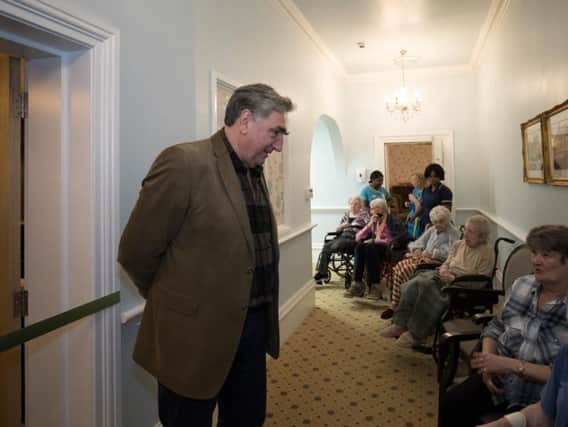 Jim Carter talking to residents before cutting the ribbon. Picture: Roland Fawcett.