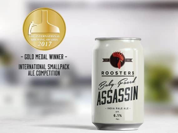 Hat-trick of medals - Rooster's award-winning Baby-Faced Assassin in cans.