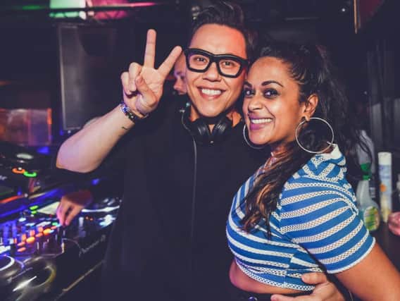 Gok Wan snaps a pic with Viper Rooms DJ. Picture: Licklist