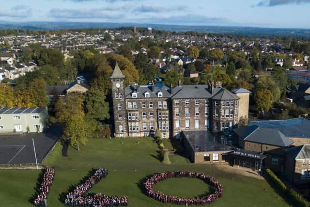 140 and Counting! 700 pupils from Ashville Colleges Prep School, Senior School and Sixth Form make a giant 140 on the schools playing fields. Picture: Different PR