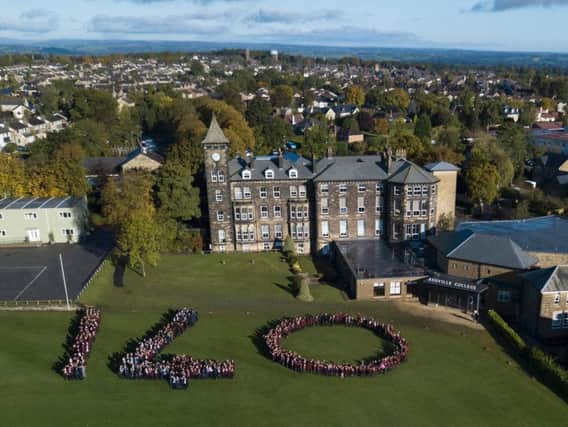 140 and Counting! 700 pupils from Ashville Colleges Prep School, Senior School and Sixth Form make a giant 140 on the schools playing fields. Picture: Different PR
