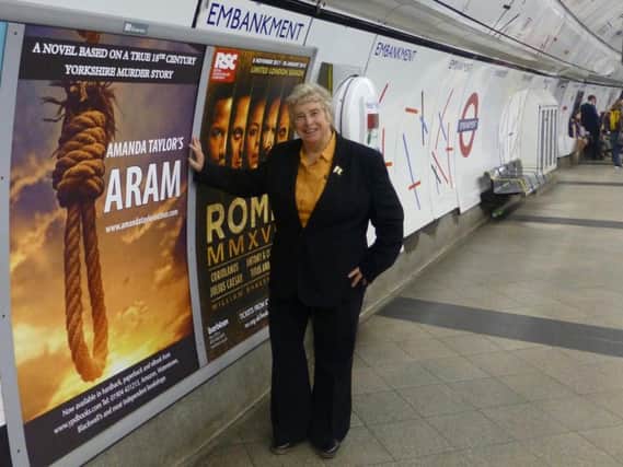 Harrogate author Amanda Taylor with the London Underground poster for her new novel.