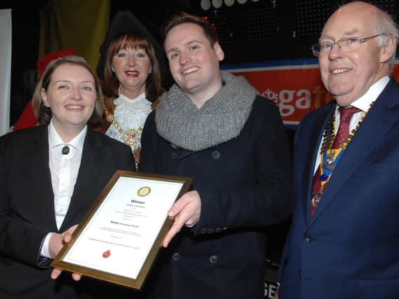 The Mayor of Harrogate Coun Anne Jones and The President of the Rotary Club of Harrogate Graham Saunders presented Eliza Mellor ond Robyn Cox of Bettys with The Best Large Shop Window Display Award. (1711162AM17)