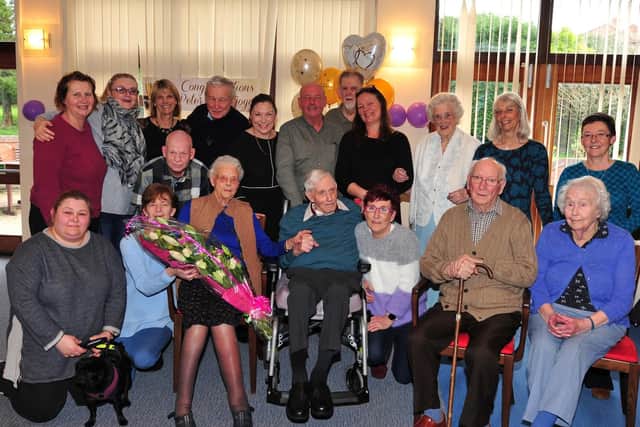 Pictured are Peter and Joyce with friends and family, celebrating their 75th wedding anniversary at Lister House. Picture: Gerard Binks.