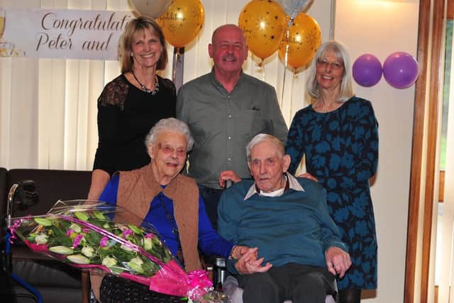 Pictured are Joyce and Peter with family: from left - Jill Cox, Robert Dawson and Fiona Cox. Picture: Gerard Binks.