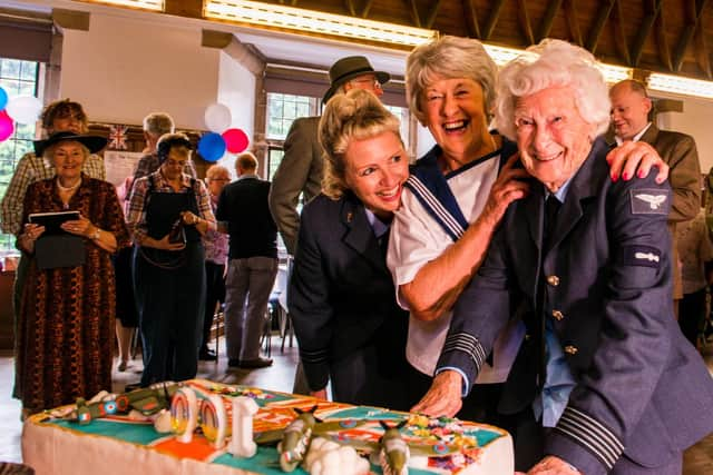 All smiles: Molly with her birthday cake and family and friends. Picture: Ernesto Rogata.