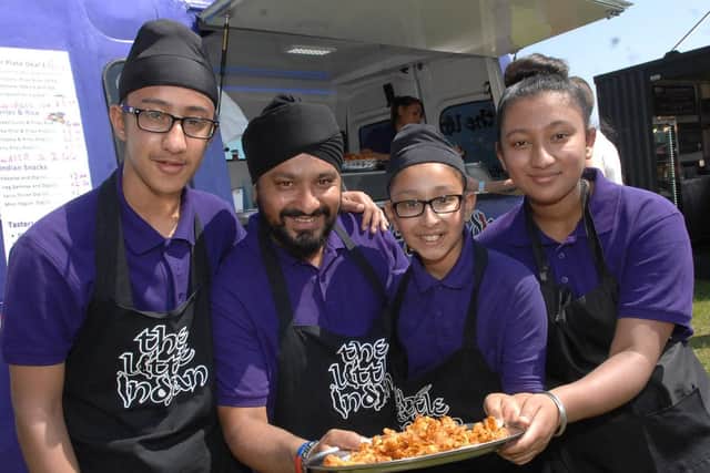 Tasty food at Harrogate event - StrEat Food Festival vendors Aaron Singh, Gee Singh, Ryan Singh and Kiran Rani Singh of The Little Indian. (1805264AM4)