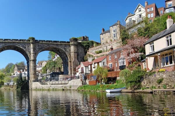 The Waterside in Knaresborough with the viaduct on the left and the start of the cliff on the right.