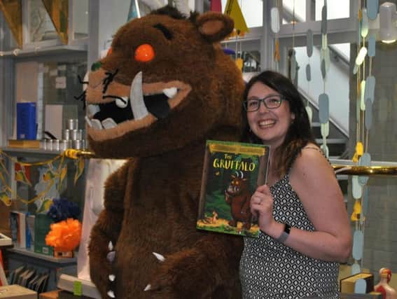 Georgia Duffy, managing director of Imagined Things book store in Harrogate - and a Gruffalo!