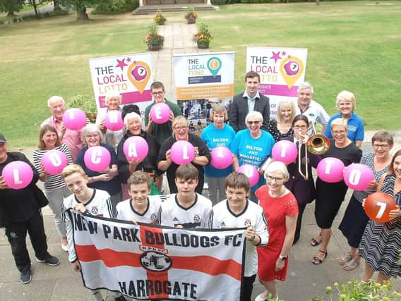 The launch of Harrogate Borough Councils The Local Lotto with Ann Byrne., community groups and New Park Bulldogs FC. (1807165AM1)