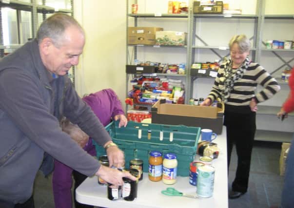 Volunteers sort donations at Wetherby and District Foodbank.