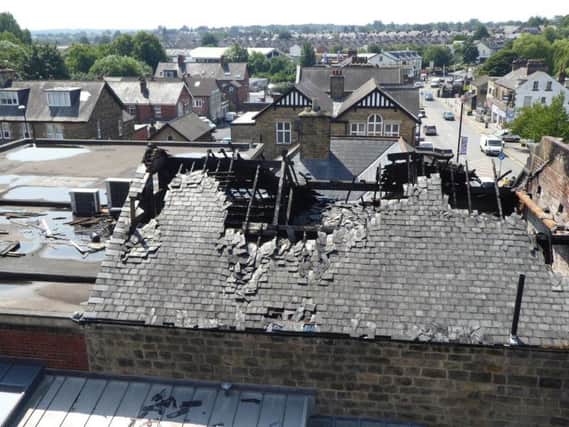 The exposed roof of the former McColl's store in Starbeck. (Picture by David Leonard)