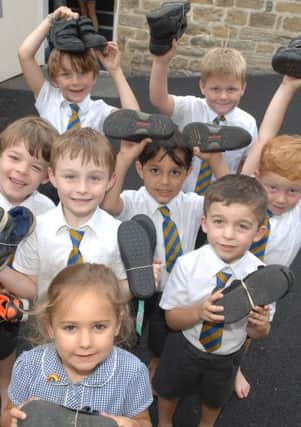 NAWN 1807244AM1 Harewood Primary School shoe donation. Some of the pupils from Harewood Primary School who donated their shoes. (1807244AM1)