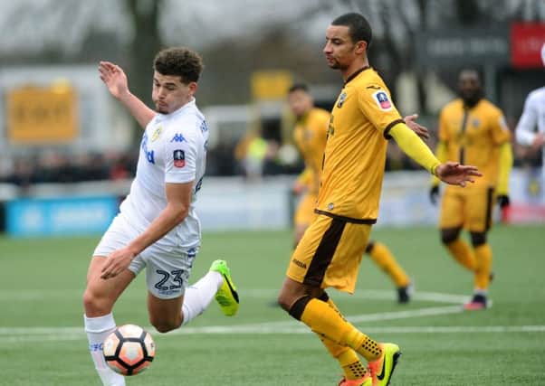 Sutton United's Craig Eastmond, right, in action against Leeds United in the FA Cup. Picture : Jonathan Gawthorpe