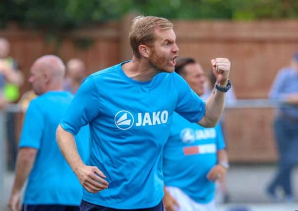 Simon Weaver urges his side on from the side of the pitch during the 2-2 draw with Sutton United. Picture: Matt Kirkham