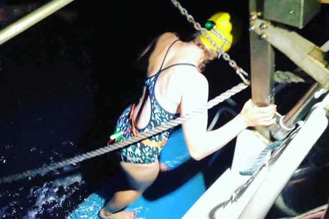 Hannah battled cold water in the dark, sickness and disorientation - all without a wet suit!