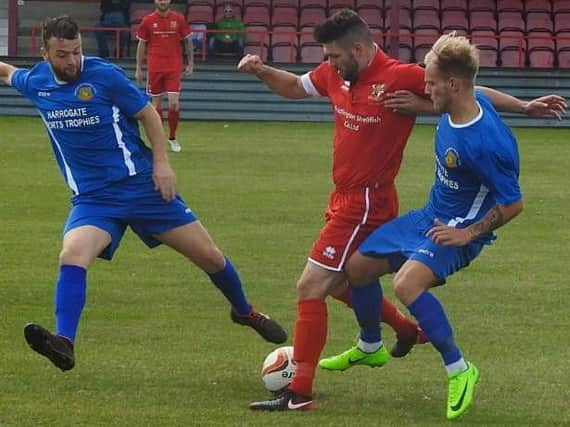 Action from Harrogate Railway's FA Cup loss at Bridlington Town. Picture: Dave Bolam