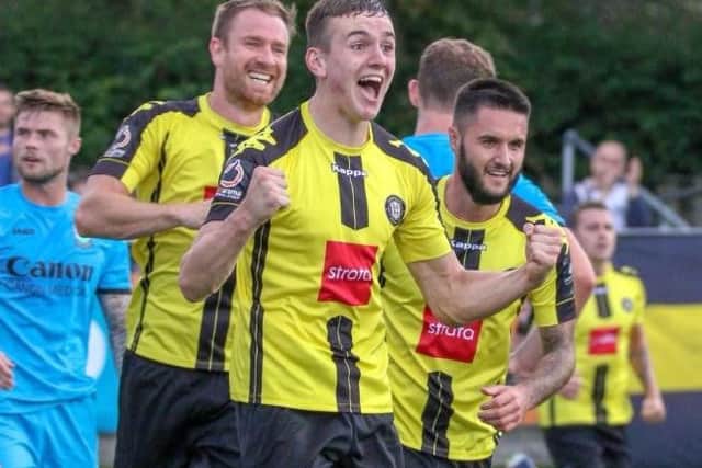 Liam Kitching celebrates after netting Town's second goal against Barnet. Picture: Matt Kirkham