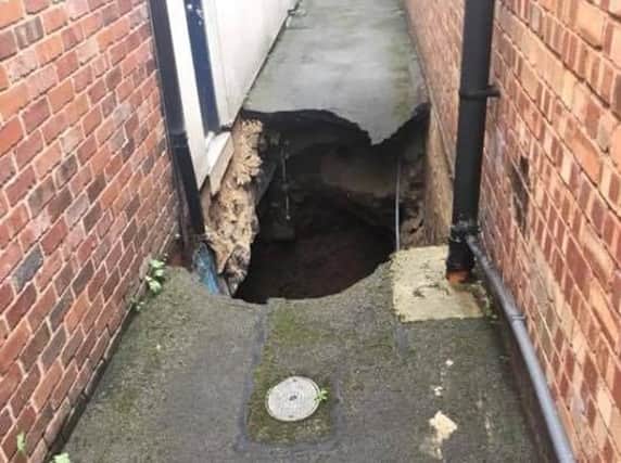 The sinkhole that's opened at the back of Sainsbury's in Ripon.