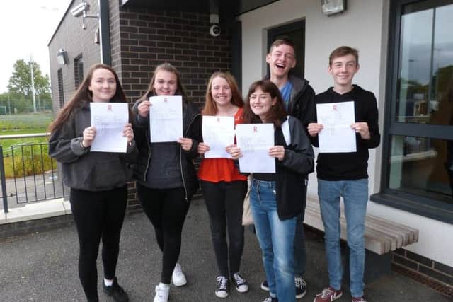 Students celebrating success at Rossett.
Credit: Vicky Carr