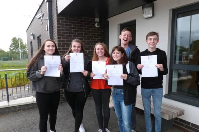 Students celebrating success at Rossett.
Credit: Vicky Carr