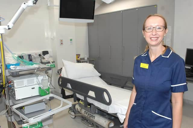 Lorraine Dyson inside one of the new and updated procedure rooms.