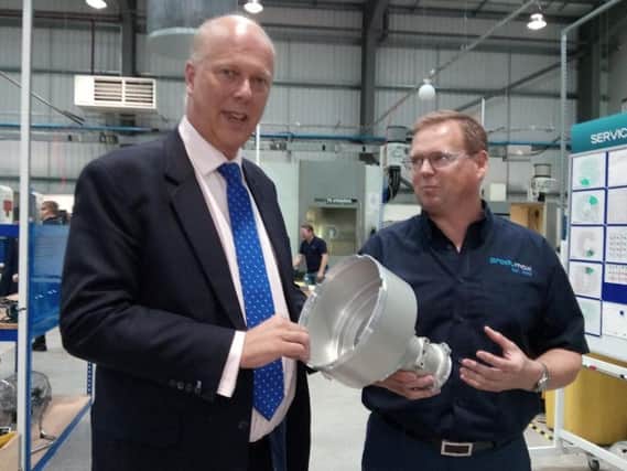 Harrogate announcement - Transport Secretary Chris Grayling with Jeremy Ridyard, managing director and co-owner of Produmax engineering firm in Baildon near Shipley. (Picture by Graham Chalmers)