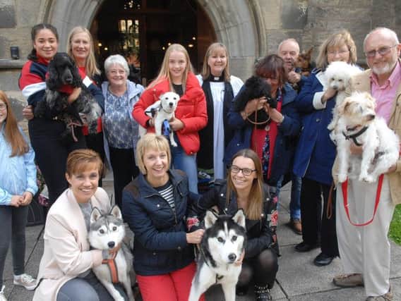 Pet blessing at St Thomas's Church. The Rev Chrissy Wilson with members of the congregation and their dogs. (1809161AM1).