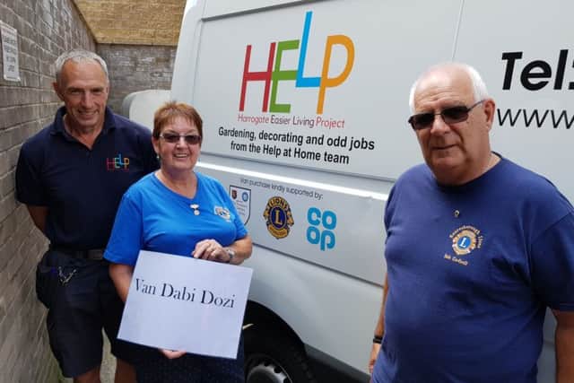 Volunteer Brian with Lions Pam and Bob and HELP vehicle Van Dabi Dozi.