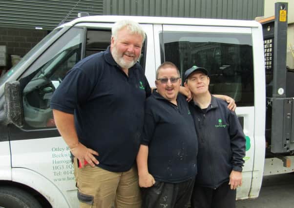 Phil, Simon and Michael from Horticap collect items from Green-tech.
