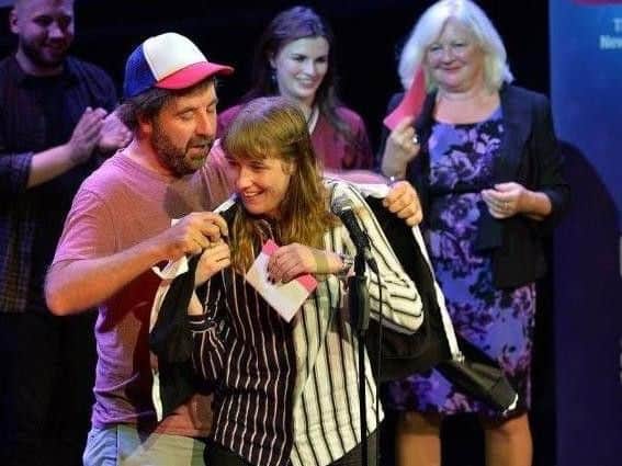 Harrogate's Maisie Adam receiving the UK's So You Think You're Funny? award from David O'Doherty at the Edinburgh Fringe last year.