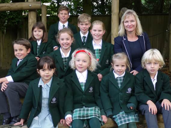 New headteacher of Harrogate Brackenfield School Mrs Nicola Matthews with some of the pupils.