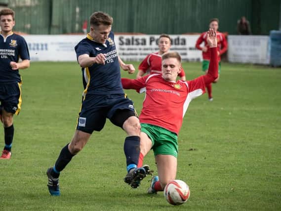 Marcus Day in action for Harrogate Railway against Bridlington Town. Picture: Caught Light Photography