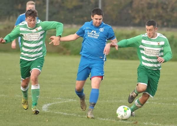 Phil Wix, left, netted for Boroughbridge as they closed in on the top of the Division One table
