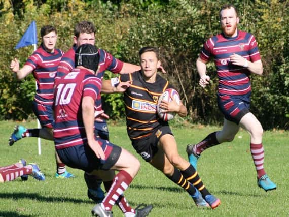 Harrogate Pythons ace Ned Rutty runs at the Aireborough defence on his way to the try-line