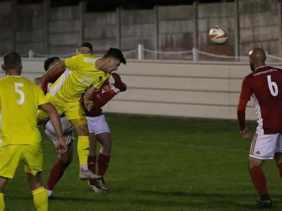 Dan Thirkell heads in Knaresborough Town's late winner at Thackley. Picture: Craig Dinsdale