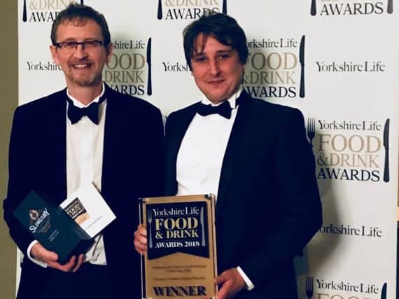 Head brewer Oliver Fozard and brewing team leader Stuart Goddard receiving the Yorkshire Life award on behalf of Roosters.
